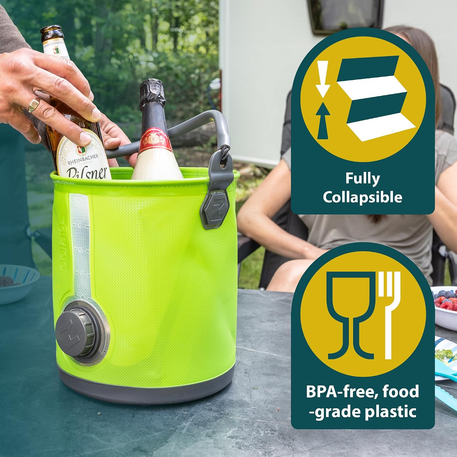 Lime green Colapz collapsible container used as a drinks bucket holding beer and champagne bottles on a camp table