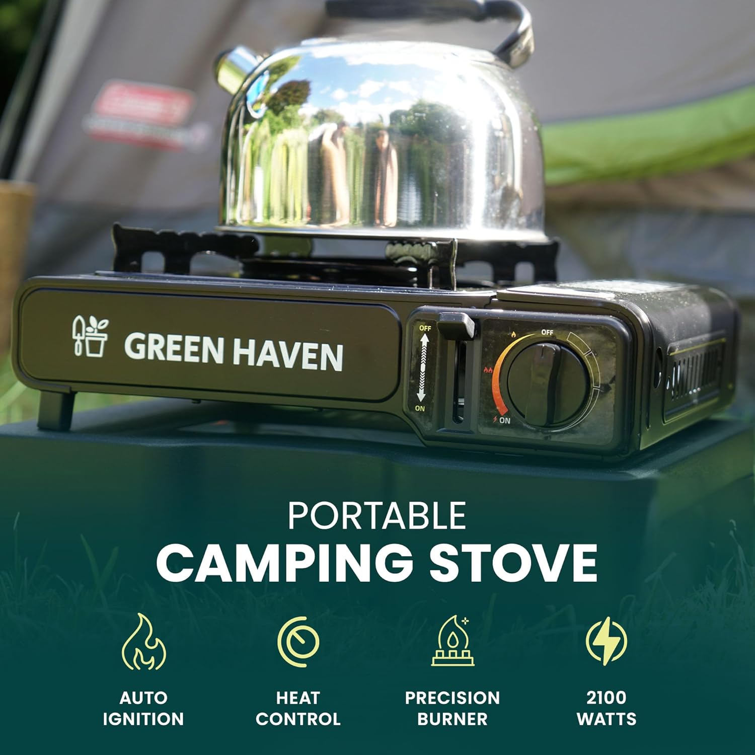 Green Haven portable camping stove with kettle at campsite, tent visible in background
