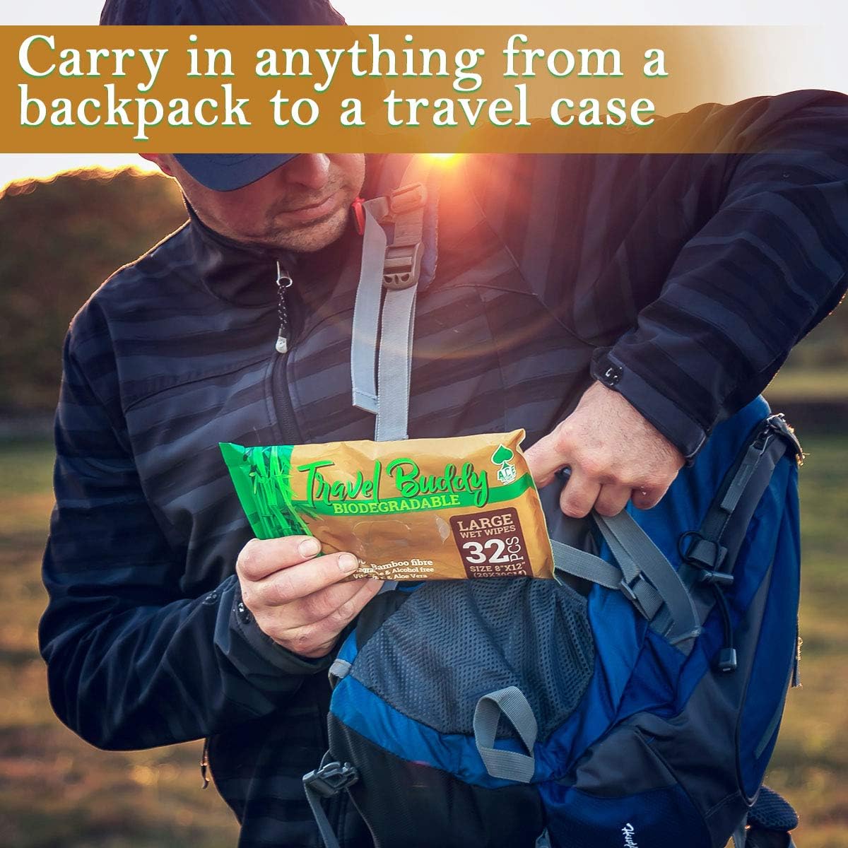 Hiker tucking a pack of Ace Travel Buddy wipes into a backpack at sunset