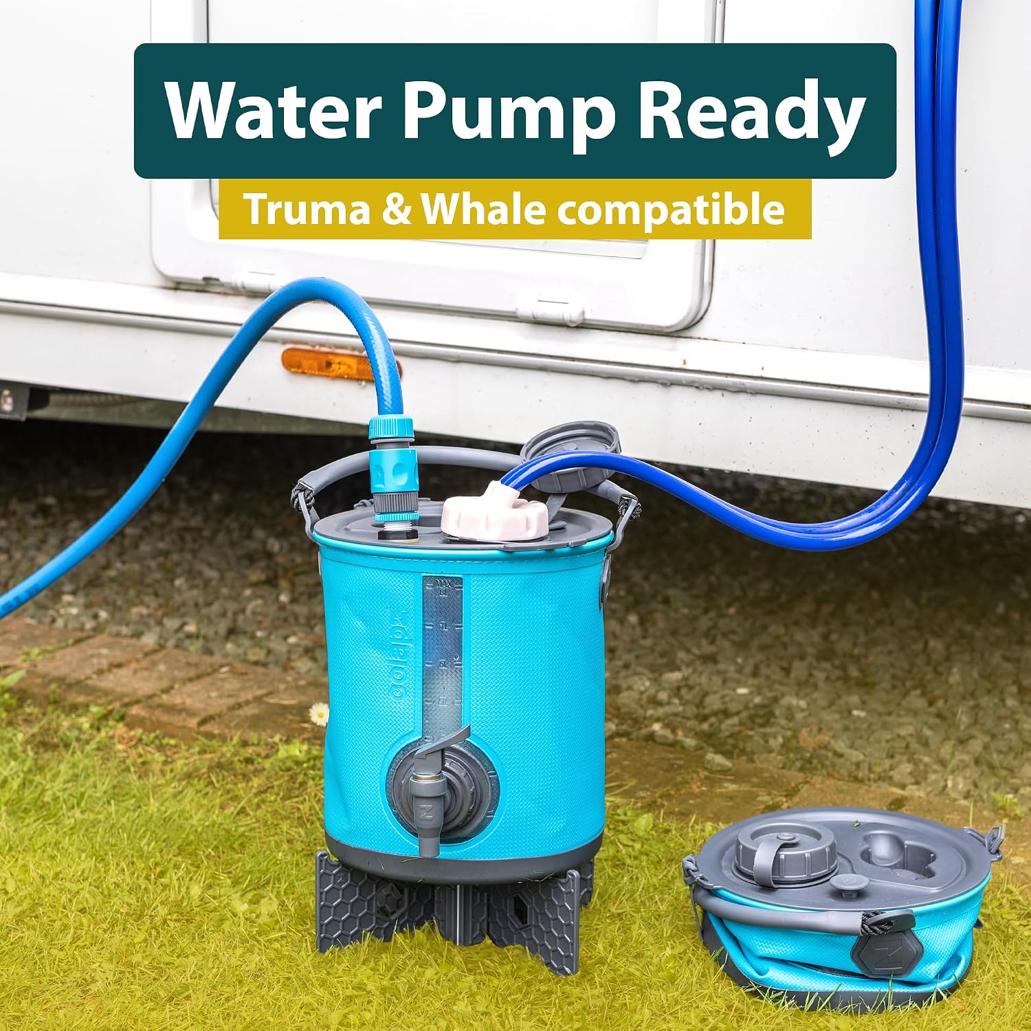 Teal Colapz container beside a caravan with a blue water hose entering the lid, standing on a dark folding base, with a second unit collapsed flat alongside