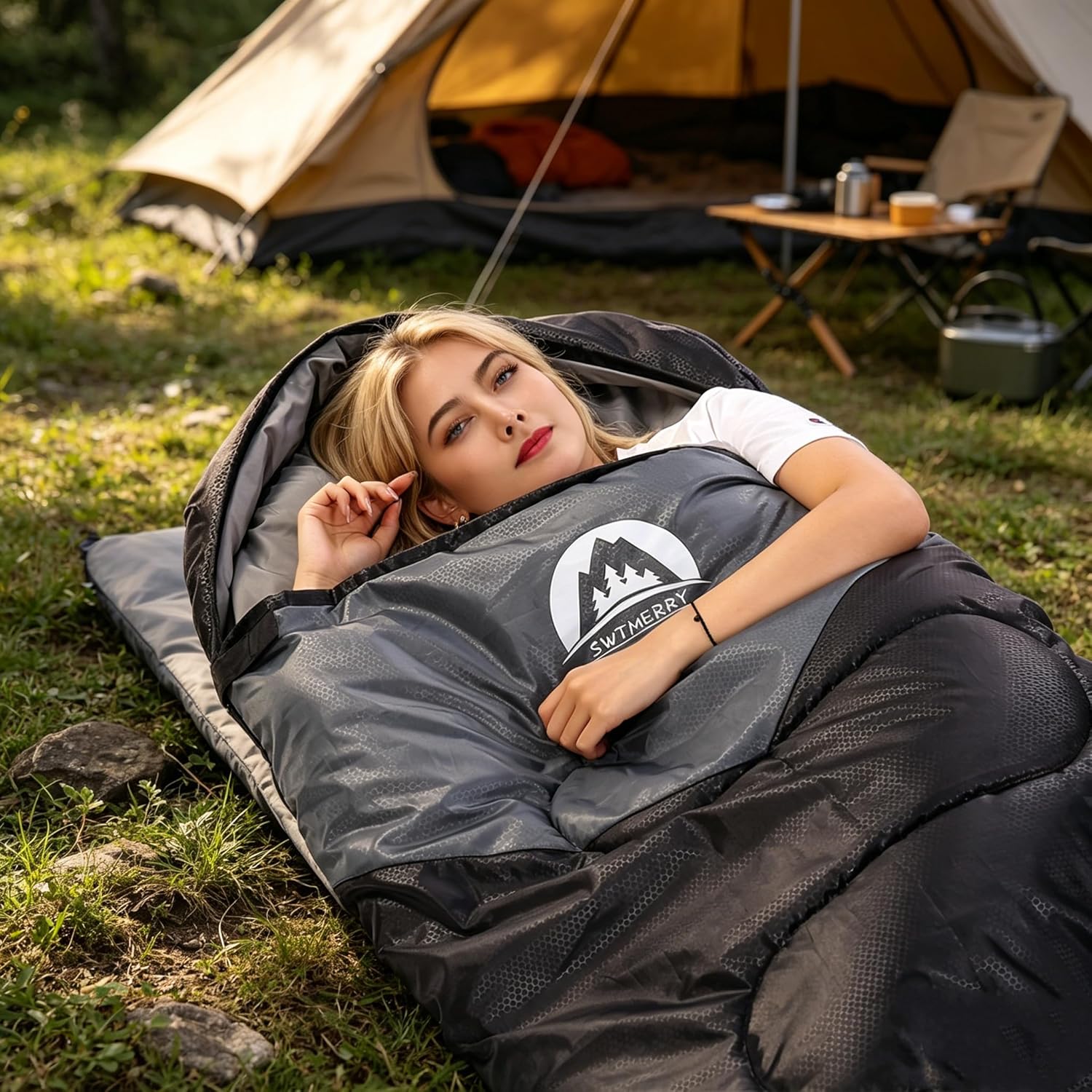 Close-up of the SWTMERRY sleeping bag unzipped along its side zip with the grey lining and pillow area visible