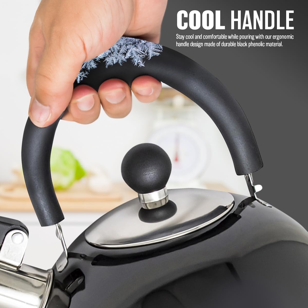 Hand gripping the black phenolic arch handle above the kettle's stainless lid
