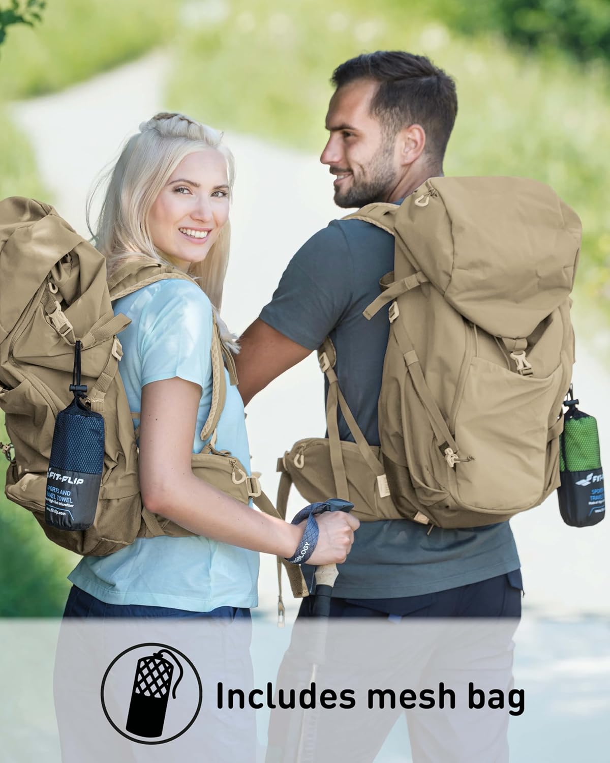 Two hikers on a woodland trail with Fit-Flip mesh towel bags clipped to their rucksacks