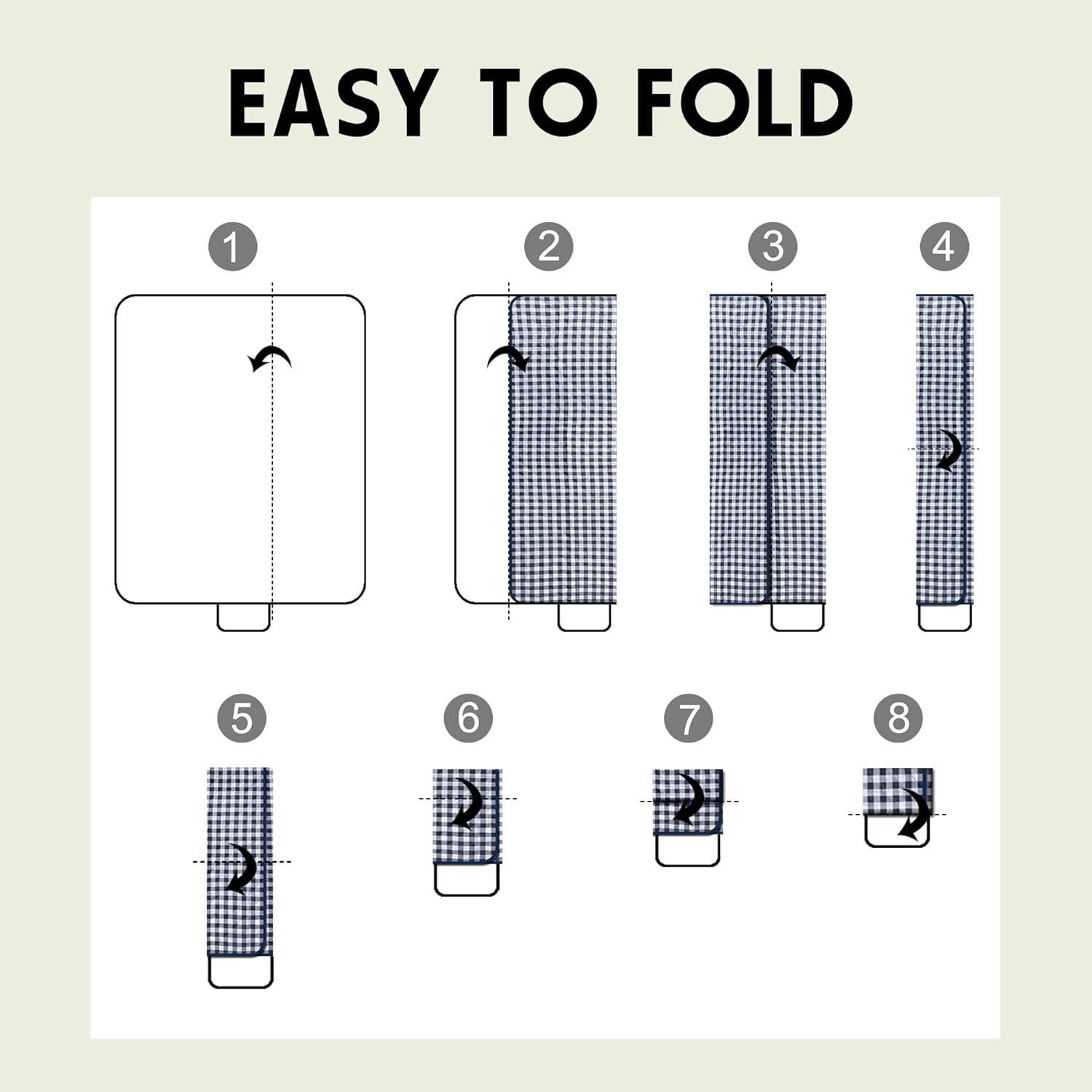 SAMSIER folded picnic mat with carry handle ready to be carried across a field