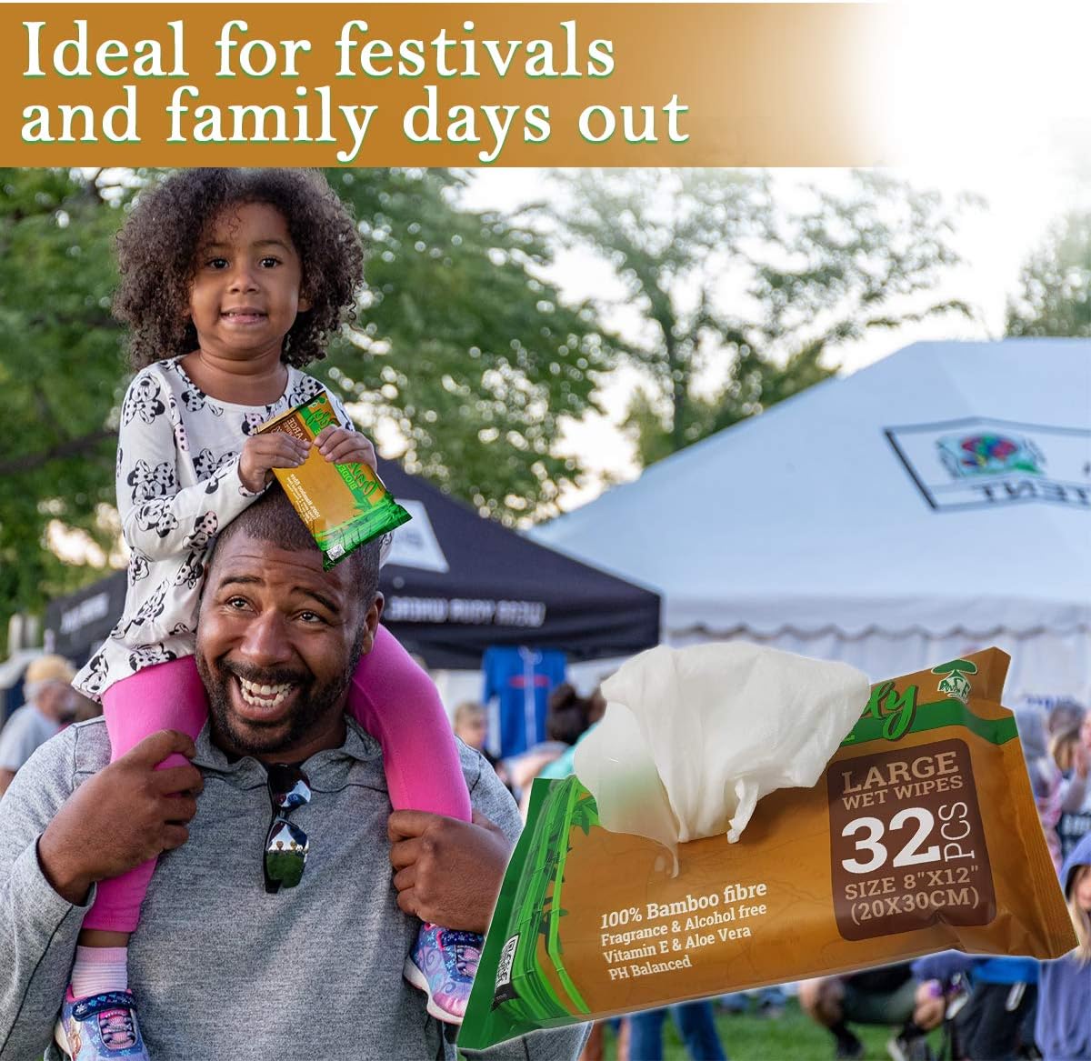 Family at a festival with a child holding a pack of Travel Buddy wipes