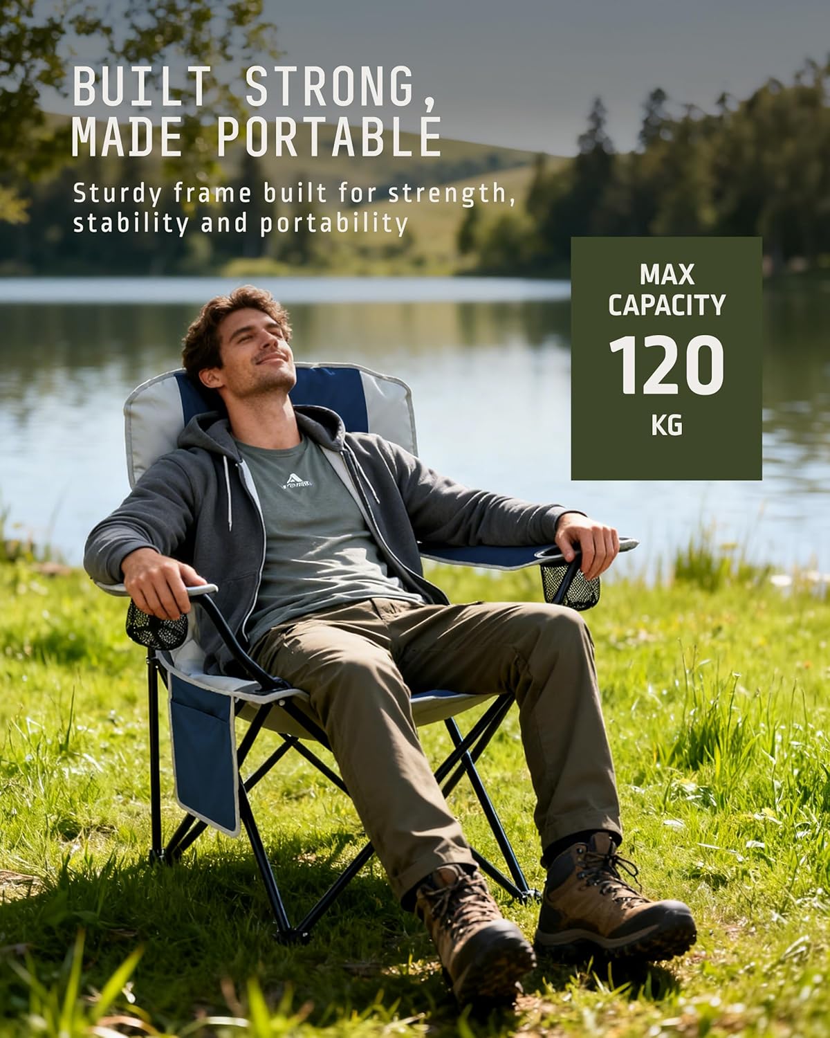Lifestyle shot of a man reclining in a Voyager camping chair with 120kg max capacity label