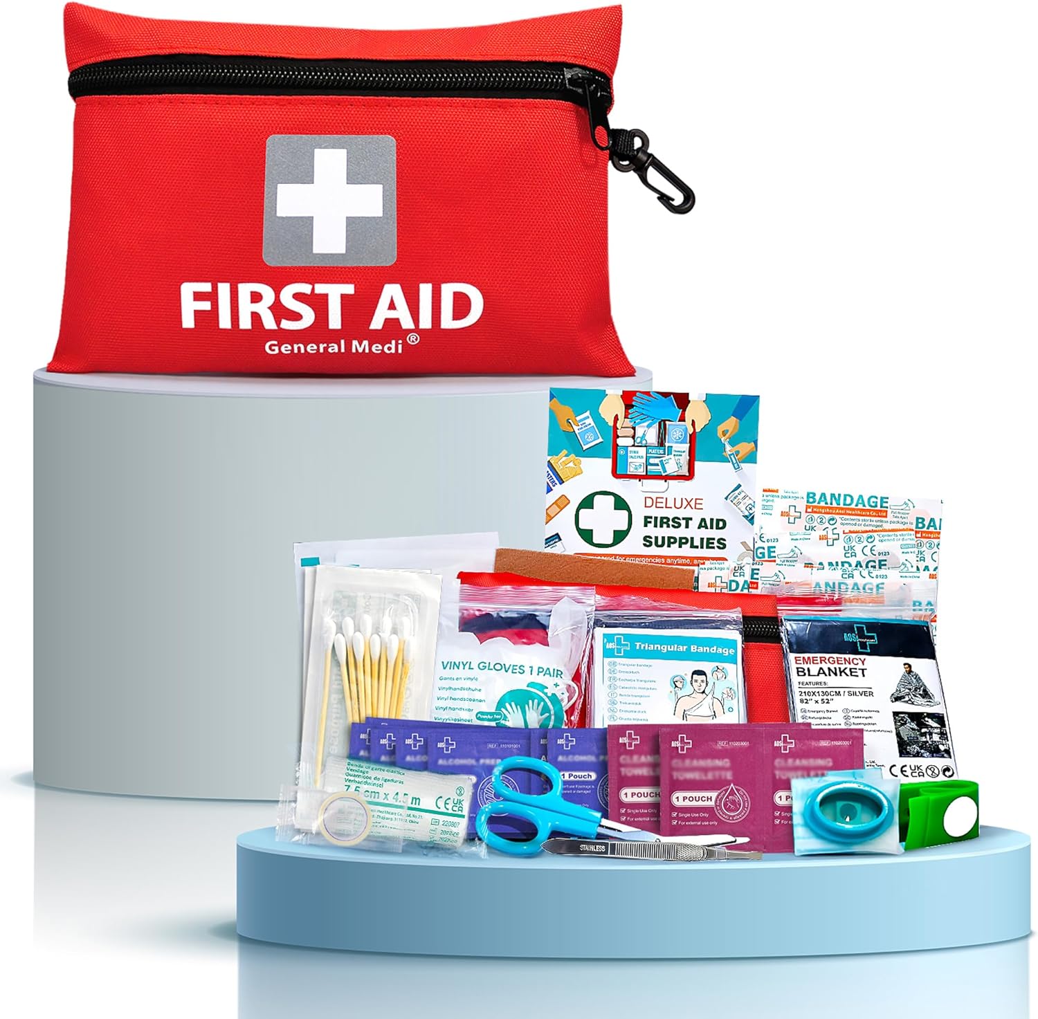 Studio shot of the red General Medi first aid pouch on a blue platform with all contents neatly arranged around it